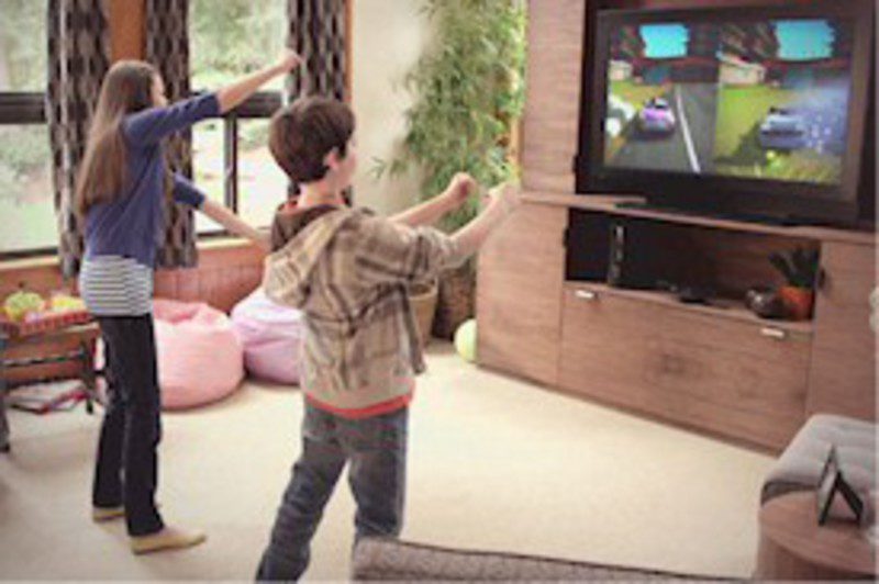 Niños jugando a Kinect